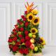 ramo de rosas girasoles flores exoticas y frutas en una base de madera con envio a domicilio 
